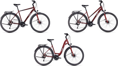 Drei Cube Touring EXC Fahrräder nebeneinander: eins mit Diamantrahmen, eins mit Trapezrahmen und eins als Tiefeinsteiger.
